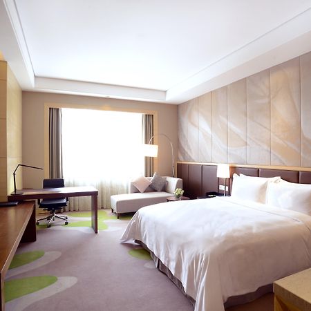 Hai Tian Expo Hotel Qingdao Extérieur photo